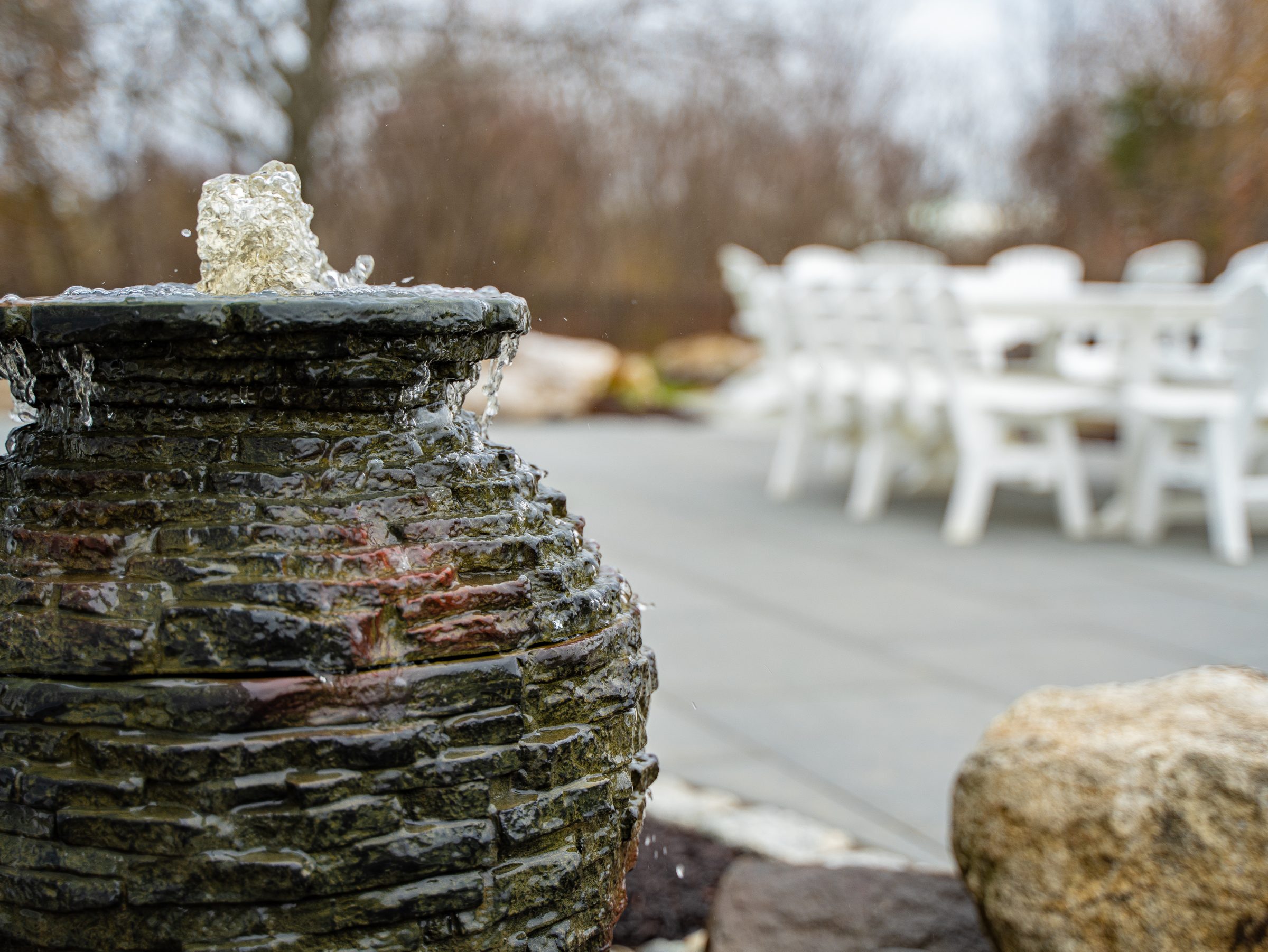 Close-up of small stone fountain outdoors