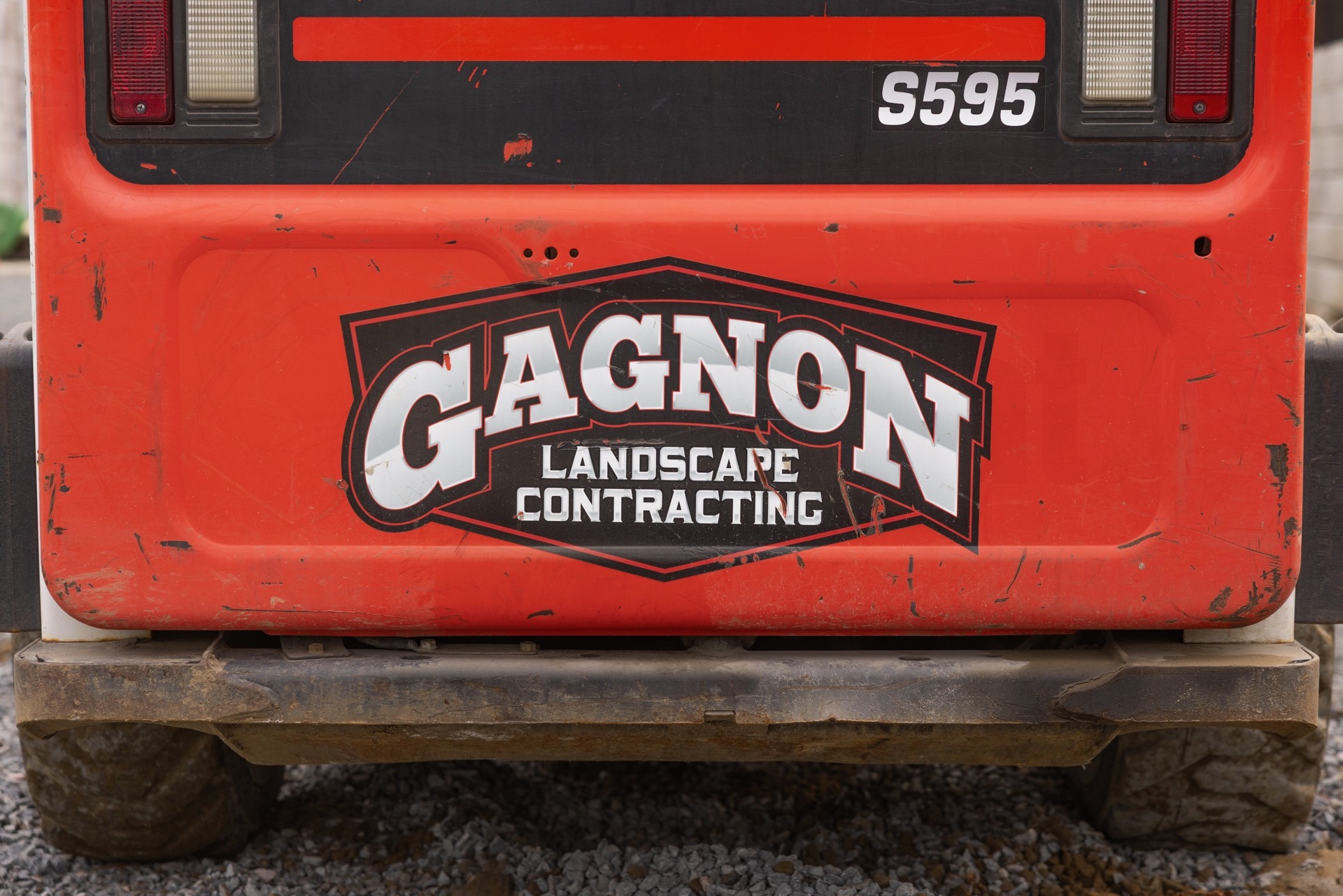 Gagnon Landscape Contracting logo on orange machinery