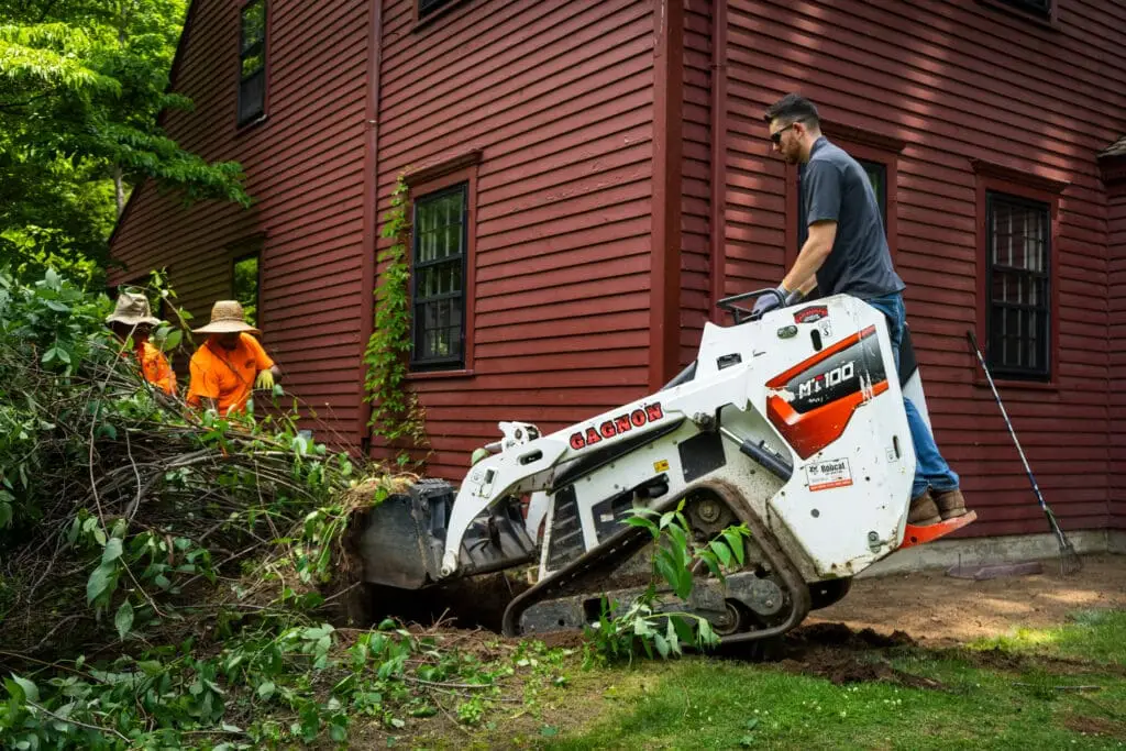 Gagnon Landscape Contracting removing trees and shrubs with bobcat