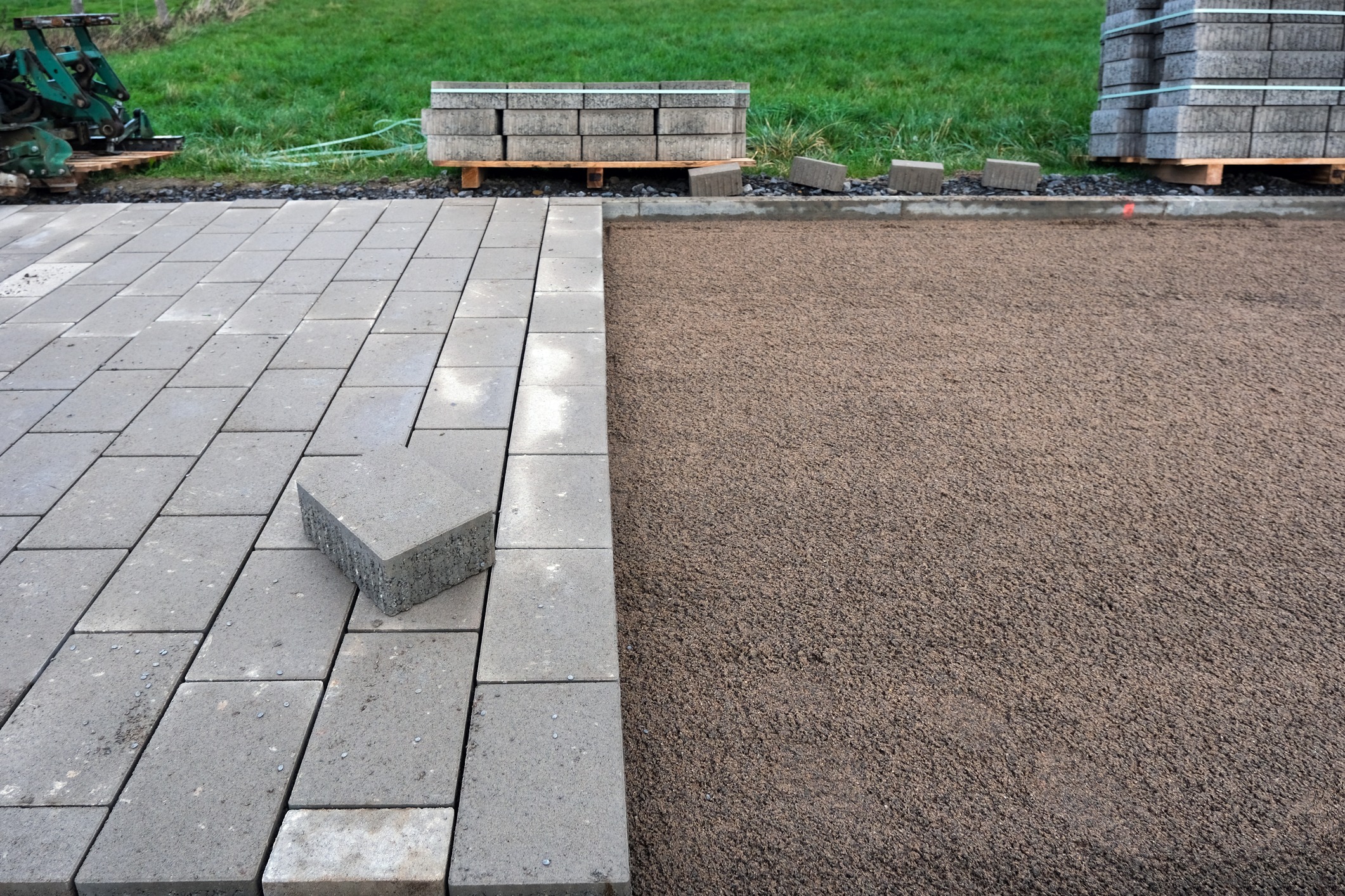 Installing concrete paver patio with gravel base